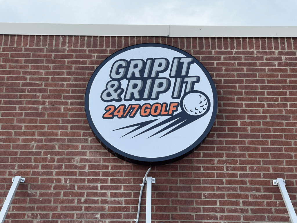 Grip It & Rip It Golf building exterior showing accessible entrance in Palestine TX