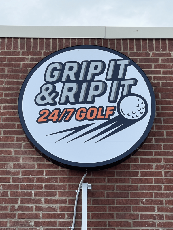 Welcoming exterior of family-friendly Grip It & Rip It Golf in Palestine Texas